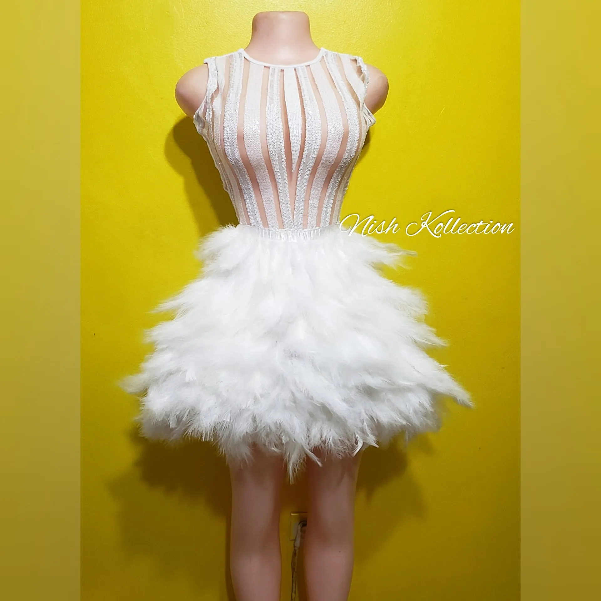 White Brinxx feather mini dress